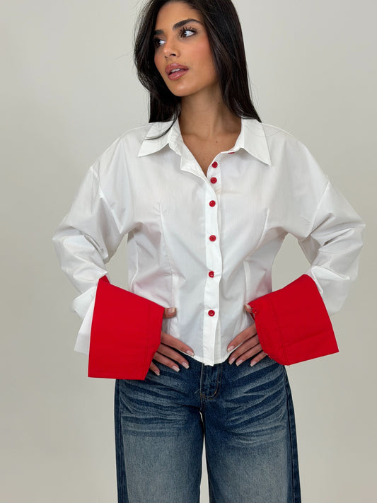 camicia bottoni rossi